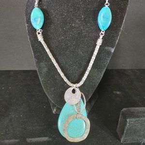 South western style faux torquoise necklace with beautiful circular adornments